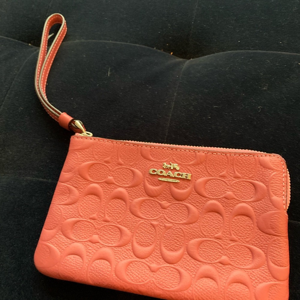 embossed coach wristlet